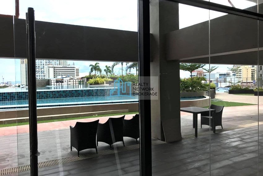 base-line-tower-studio-unit-for-sale-poolside-view